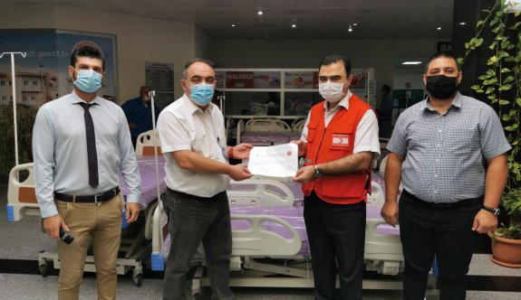 Kuzey Kıbrıs Tük Kızılay'ından hastaneler 65 yatak bağışı